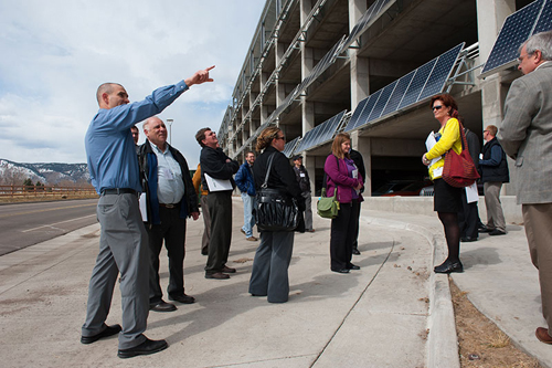 NREL's Shanti Pless leads a tour of NREL's energy-efficient parking garage.: He also spoke to community planners about garage performance and design versus actual energy use during NREL's Parking Garage Workshop. Photograph courtesy of NREL by Dennis Schroeder
